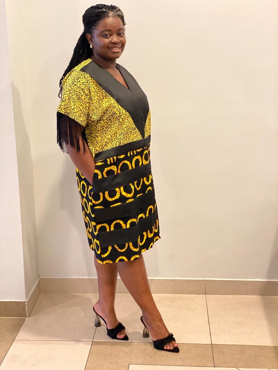 yellow dress with black heels Jacquemus La Robe Mistral Fluid Viscose Jersey Mini Dress main image 1