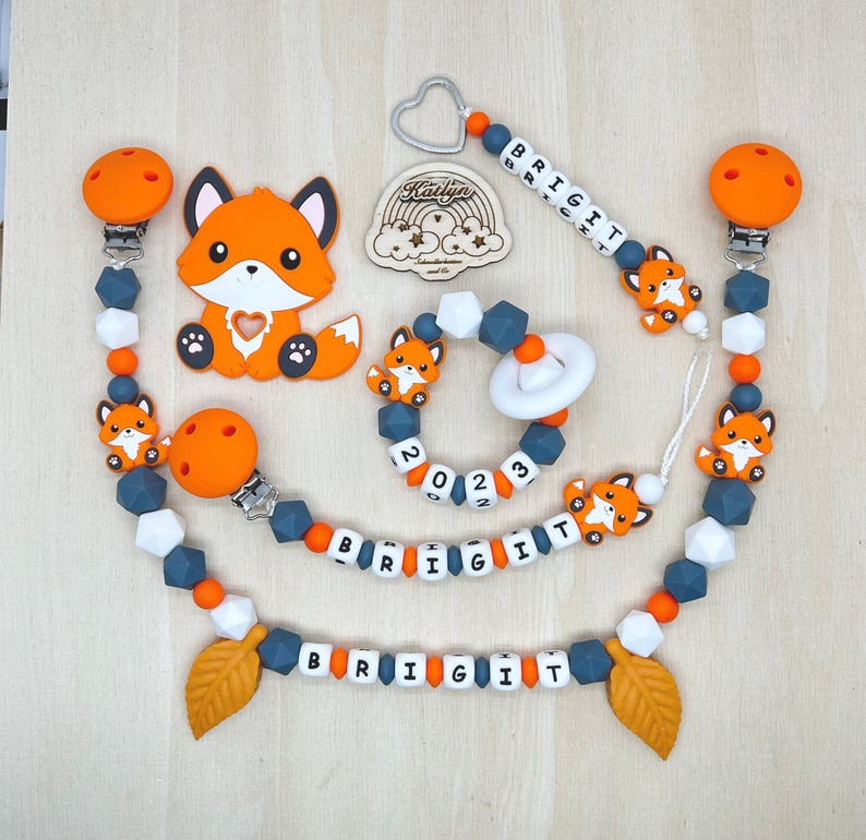 Babygeschenk Schnullerkette mit Name , kinderwagenkette, schlüsselanhänger und Greifling aus silikon perlen Fuchs Ring adaptor gratis Bild 1