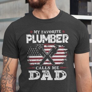 My Favorite Plumber Calls Me Dad, Plumber Dad Shirt, Father&#39;s Day Tshirt, Gift for Plumber Dad,  Plumber Fathers Tshirt, Plumber Grandpa Tee