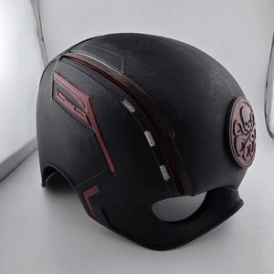 May include: Black helmet with red and white accents and a black and white Hydra logo on the side.