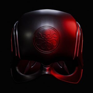 May include: A black helmet with a red glow and a stylised octopus logo on the front. The logo is a circle with a stylised octopus inside.