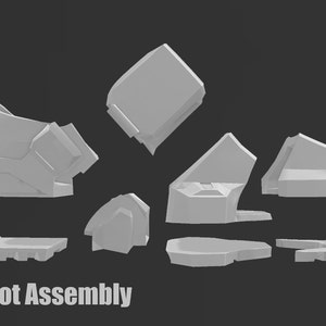 May include: A set of nine gray plastic pieces that can be assembled into a boot. The pieces are labeled "Boot Assembly".
