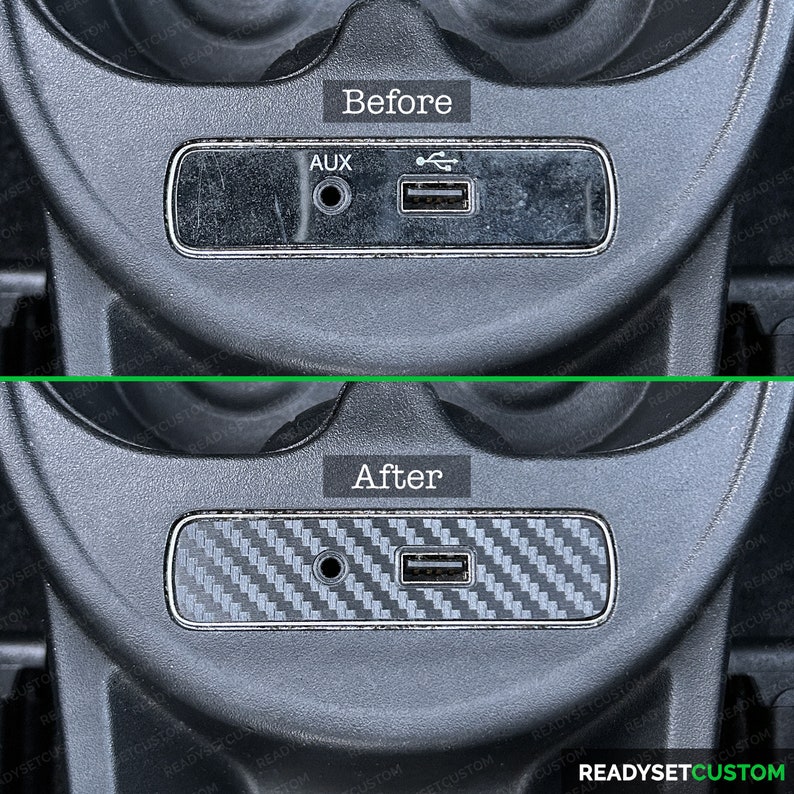May include: Before and after image showing a car's interior detail. The image shows a close-up of a black plastic panel with an AUX input and a USB port. The panel is dirty and scratched in the before image. The after image shows the same panel with a carbon fiber vinyl wrap applied, giving it a sleek and modern look.