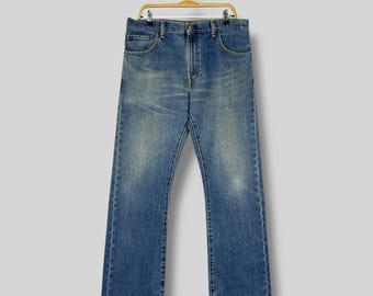 Vintage Levi's 517 Slim Fit Bootcut Jeans W35 L32 / Uneven Faded Dark Washed Denim / Y2K Levis Saddleman Distressed Jeans Made In Mexico