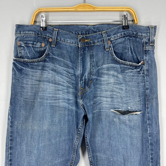 W38 L32 Vintage Levis 507 Distressed Ripped Jeans Levis High Rise