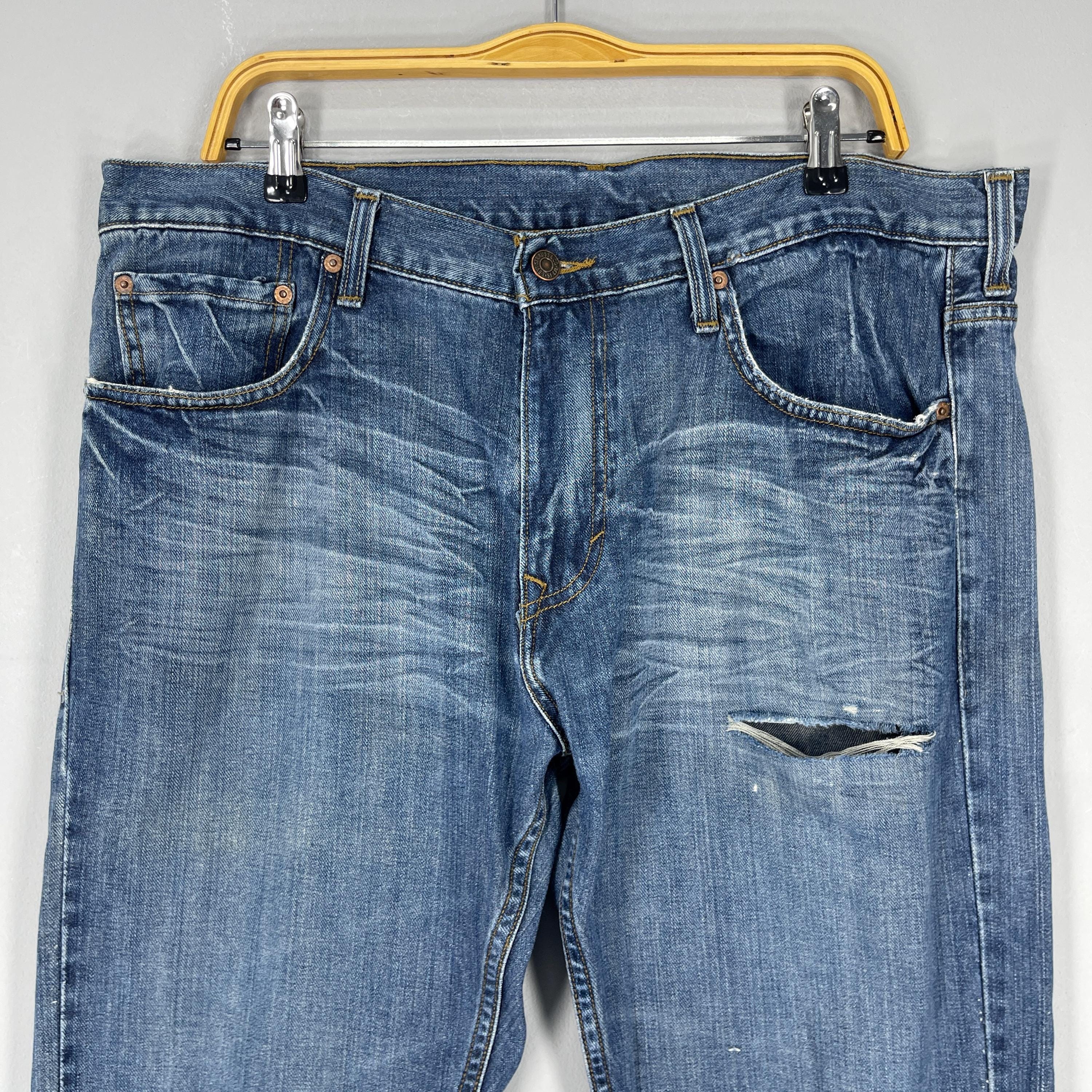 W38 L32 Vintage Levis 507 Distressed Ripped Jeans Levis High Rise