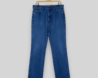 Talla 33 Vaqueros desgastados de cintura alta Wrangler vintage Vaqueros Wrangler con cierre de cremallera y lavado oscuro Vaqueros Boyfriend Wrangler fabricados en EE. UU. W33 L32