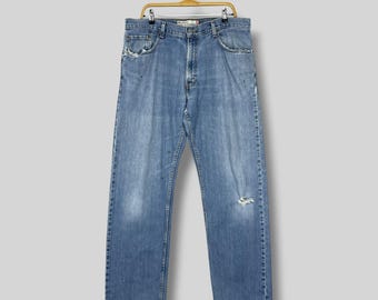 Jeans Levi's 559 de corte relajado, corte recto, talla W38 L33 / Tiro alto, mezclilla lavada de tono medio / Jeans boyfriend desgastados y rotos estilo Y2K