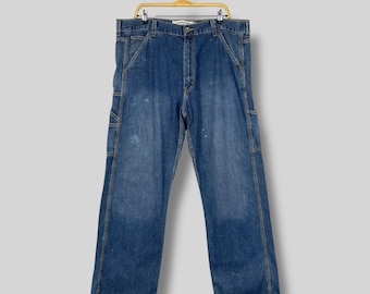 W38 L32 Vintage Levis 507 Distressed Ripped Jeans Levis High Rise