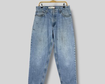 Vintage Levi's 560 Baggy Jeans, Faded Denim, Relaxed Fit (W31 L34