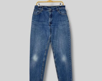 Vintage 90s Levi’s 550 Relaxed Fit Tapered Leg Jeans / High Waisted Medium Wash Denim / Distressed Mom Jeans Women’s 14 MIS M Made In Mexico