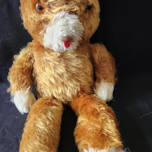 Vintage 12&quot; plush teddy with red tongue