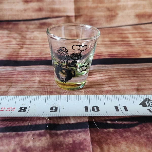 Vintage Jungle Juice shotglass with man in cauldron/pot