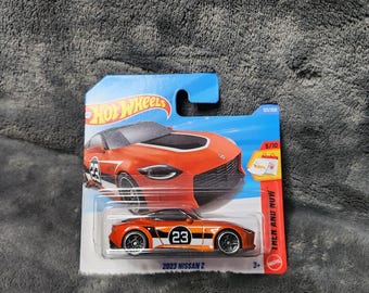 M* 2025 Mattel Hotwheels Orange 2023 Nissan Z  HW Then and Now Series 5/10 121/250 SHORT Card