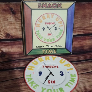Vintage colorful snack time clock with the box included.