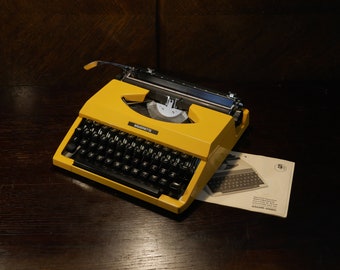 Vintage Working Typewriter Seiko Silverette Portable Typewriter With Case Yellow Typewriter Unusual gift for students Manual Typewriter Gift