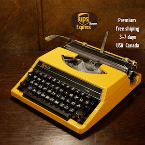 Typewriter Welco S100 Vintage portable typewriter with case made in Japan Classic typewriter Yellow manual typewriter