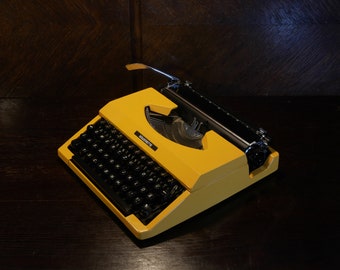 Funktionierende Vintage-Schreibmaschine Seiko Silverette Tragbare Schreibmaschine mit Koffer Gelbe Schreibmaschine Ungewöhnliches Geschenk für Studenten Manuelle Schreibmaschine Geschenk