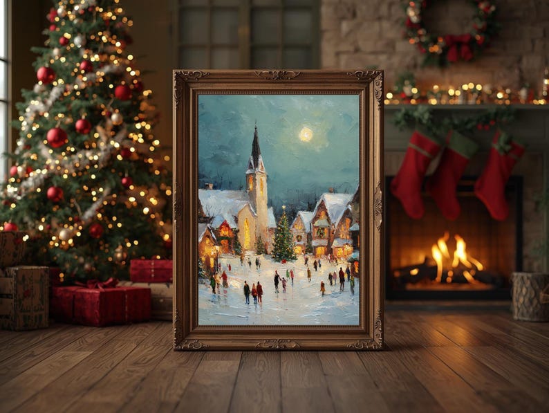 May include: A framed painting depicts a snowy village scene at night, with a church and people walking. The painting has a gold-colored ornate frame. A Christmas tree with lights and ornaments is in the background, along with a fireplace and stockings.
