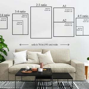 May include: A living room scene with a beige sofa, black coffee table, and a black and white striped rug. Various print sizes are displayed on the wall, including 11x14 in, 18x24 in, 24x36 in, and A1 and A2 sizes. The sofa is 76 inches wide.