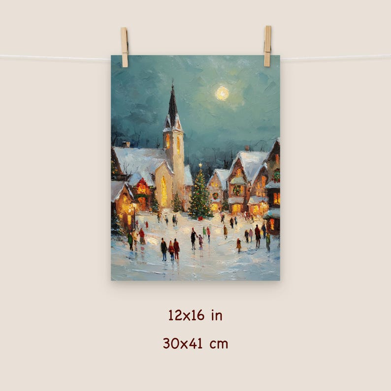 May include: A winter scene print depicting a snow-covered village square at night. The artwork features a church with a tall steeple, illuminated buildings, a Christmas tree, and silhouetted figures. The print measures 12x16 inches.