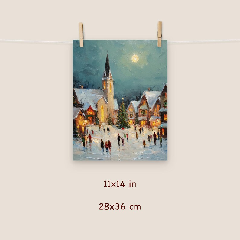 May include: An 11x14 inch print of a winter village scene. The painting depicts a church with a tall steeple, snow-covered buildings, and a Christmas tree. The artwork has a soft, painterly style with a full moon in the background.