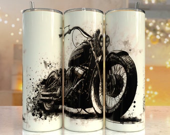 May include: A white stainless steel tumbler with a black and white illustration of a motorcycle with the text "Harley Davidson" on the side. The motorcycle is surrounded by black watercolor splatters.