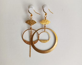 Boucles d'oreilles asymétriques