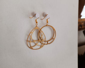 Boucles d'oreilles asymétriques