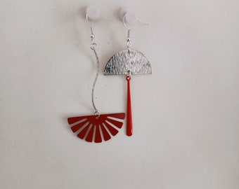 Boucles d'oreilles asymétriques