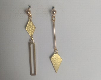 Boucles d'oreilles asymétriques