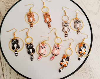 Asymmetrical earrings from the cat collection