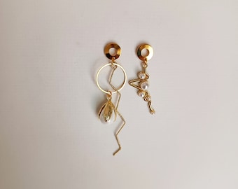 Boucles d'oreilles asymétriques