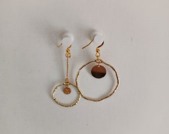 Boucles d'oreilles asymétriques