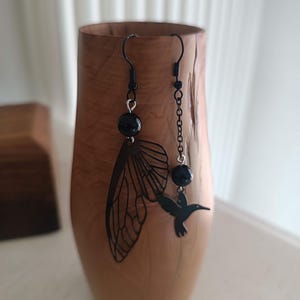Asymmetrical hummingbird earrings