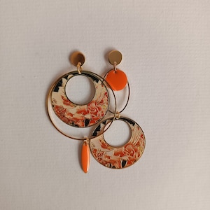 Boucles d'oreilles asymétriques Orange