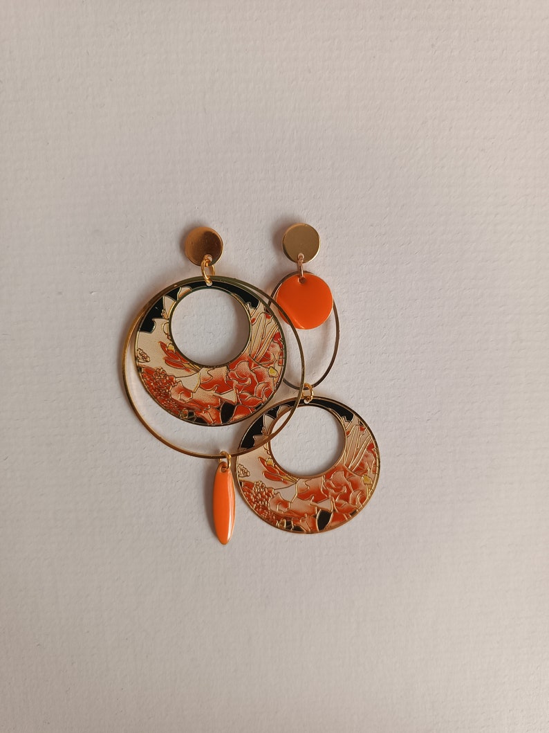 Boucles d'oreilles asymétriques Orange