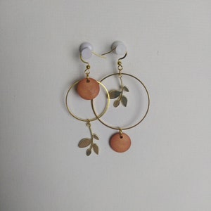 Asymmetrical earrings image 1