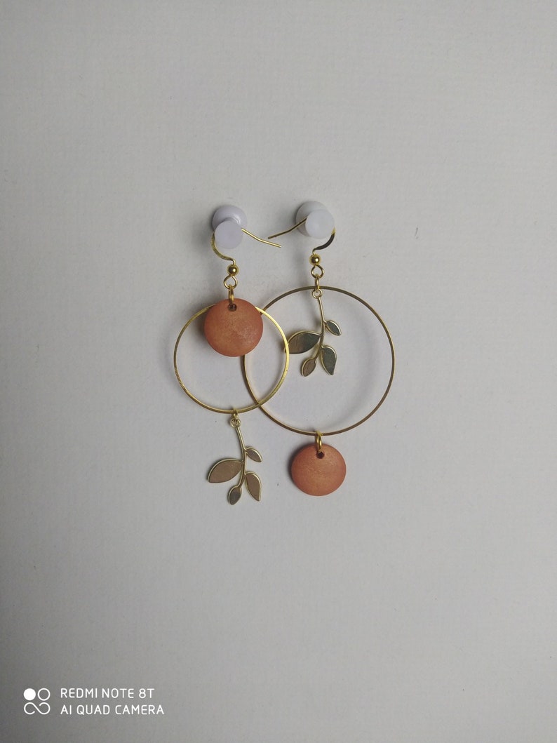 Asymmetrical earrings image 1