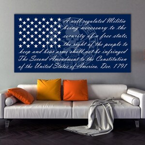 May include: A blue and white American flag with the text "A well regulated Militia being necessary to the security of a free state, the right of the people to keep and bear arms shall not be infringed The Second Amendment to the Constitution of the United States of America. Dec. 1791".