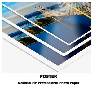 May include: A poster print of a bridge over water. The bridge is made of white metal and has a yellow support structure. The poster is printed on HP Professional Photo Paper.