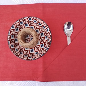 May include: A handmade wooden sign with the text "Welcome to our home" in a handwritten style. The sign is painted white with black lettering and features a small, decorative heart. It is designed for indoor or outdoor use.