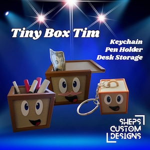 May include: Three wooden boxes with cartoon faces, one with a dollar bill, one with pens, and one keychain. The boxes are labeled "Tiny Box Tim" and "Keychain Pen Holder Desk Storage". The boxes are brown with light tan faces.