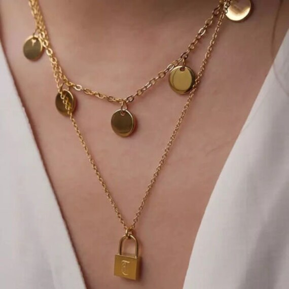 Engraved outlet lock necklace