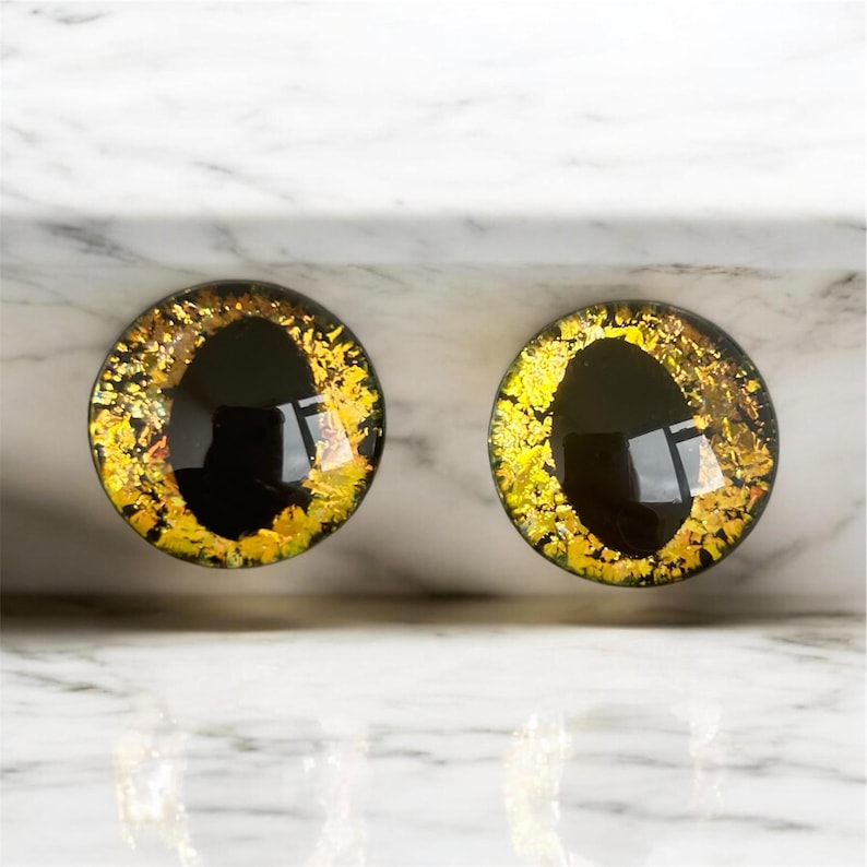 golden colour shift black pupil safety eyes 12-50mm customise pupils kawaii round dragon cat or octopus shape enhance your crochet amigurumi project all eyes are CE tested and gift wrapped perfect for all crafts to make plushies and soft toy stuffed animals