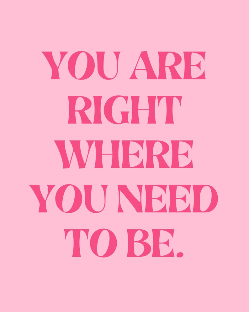 May include: Pink background with the text "You are right where you need to be." in bold, pink letters.