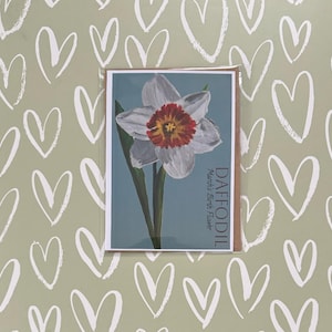 Tarjeta de felicitación con narciso y flor de nacimiento de marzo