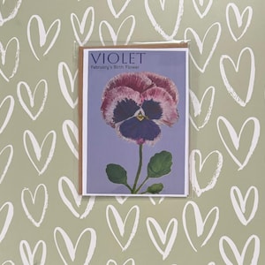 Cartão de felicitações de aniversário de fevereiro com flor violeta