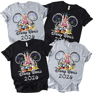 May include: A set of three ceramic mugs with a speckled, matte finish. The mugs are in shades of cream, light gray, and dark gray. Each mug has a simple, minimalist design and a rounded handle.