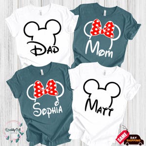 four t-shirts with personalized text and designs, likely intended for a family or group of friends.